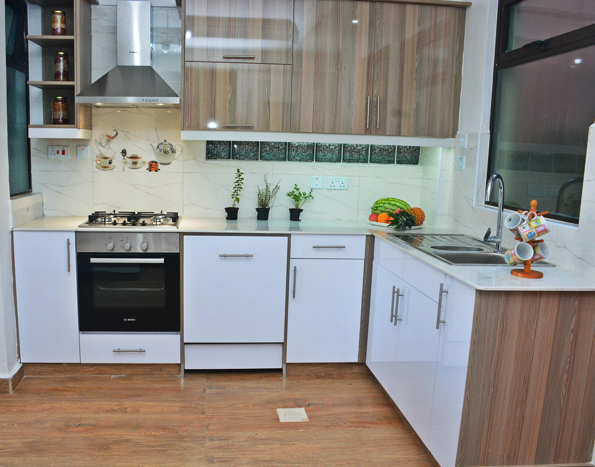 Lacquer cabinets with in-built appliances